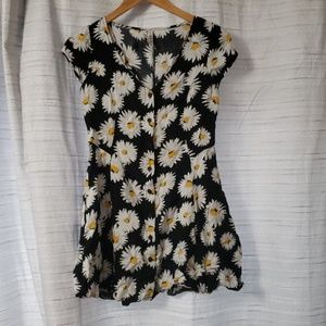 A sunflower dress/shirt with pockets.